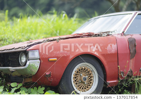 Abandoned red car Abandoned red car 137017854