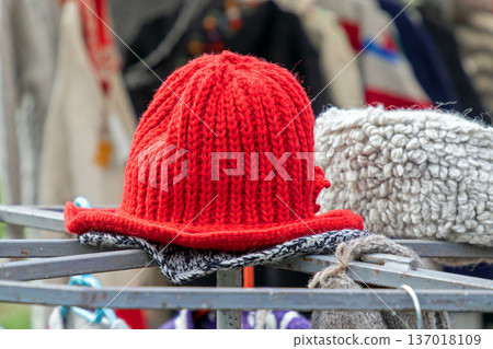 Colorful winter hats on market stall Colorful winter hats on market stall 137018109
