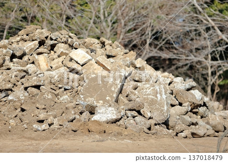 Piles of concrete rubble at a demolition site 137018479