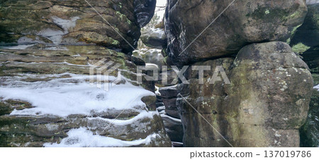 Rocks and rock formations on the Labyrinth Trail in Bledne Skaly in the Stolowe Mountains National Park. High quality photo 137019786