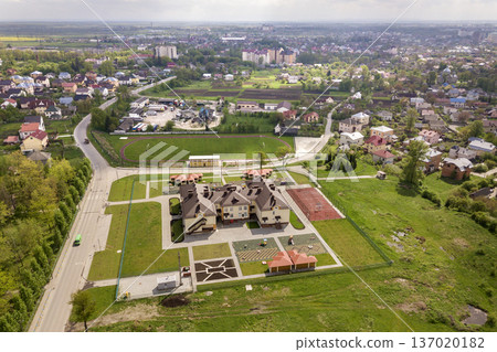 Aerial view of new prescool building in residential rural area. 137020182