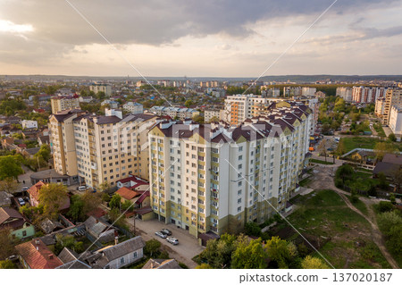 Aerial view of multistory apartment buildings in green residential area. Aerial view of multistory apartment buildings in green residential area. 137020187