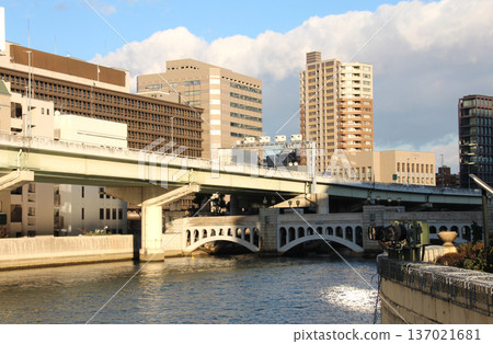 The exterior of the Osaka High Court building seen from the Suisho Bridge over the Dojima River. The exterior of the Osaka High Court building seen from the Suisho Bridge over the Dojima River. 137021681