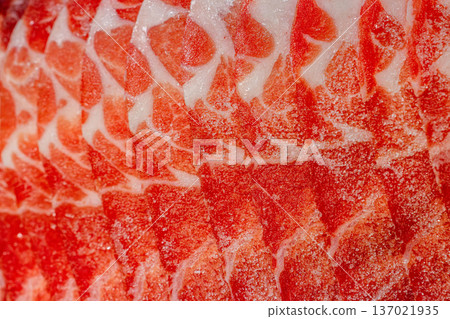 The delicate marbling of bright red frozen pork slices The delicate marbling of bright red frozen pork slices 137021935
