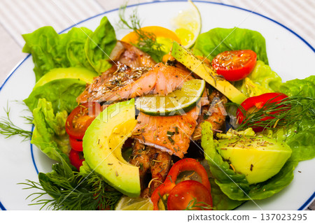 Appetizing fish salad with roasted trout 137023295