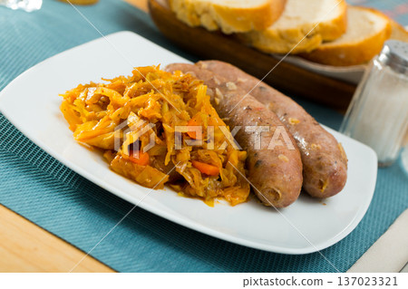 Sausages with stewed cabbage Sausages with stewed cabbage 137023321