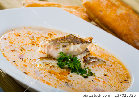 Norwegian codfish soup with baguette Norwegian codfish soup with baguette 137023329