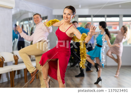 Paso doble dance during Christmas or New Year celebrations in dance studio 137023491