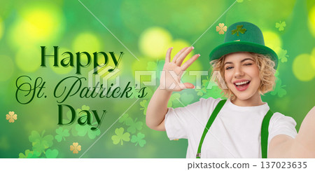 Woman in a green hat celebrating St Patricks Day Woman in a green hat celebrating St Patricks Day 137023635