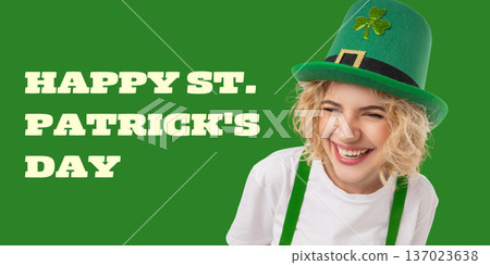 A young woman smiles while wearing a green hat and costume A young woman smiles while wearing a green hat and costume 137023638