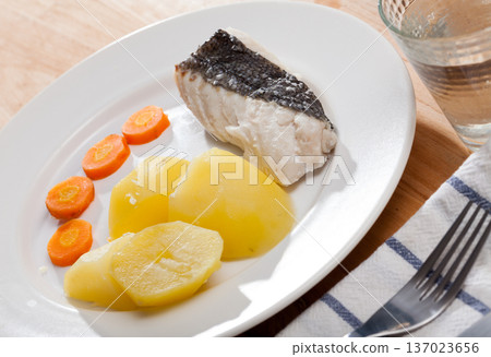 Steamed whiting with potato and carrots Steamed whiting with potato and carrots 137023656