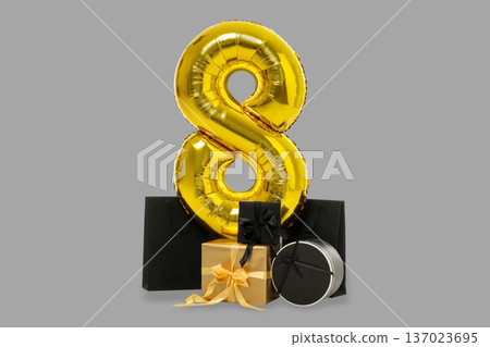 Gold number 8 balloon with gifts for a special event Gold number 8 balloon with gifts for a special event 137023695