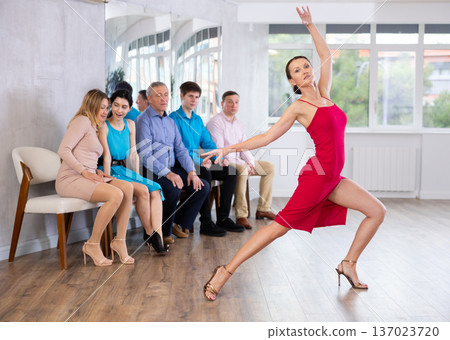 Adult woman showing dance moves 137023720