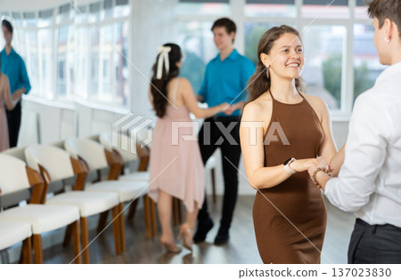 Young girl dancing sensual bachata in choreography studio Young girl dancing sensual bachata in choreography studio 137023830