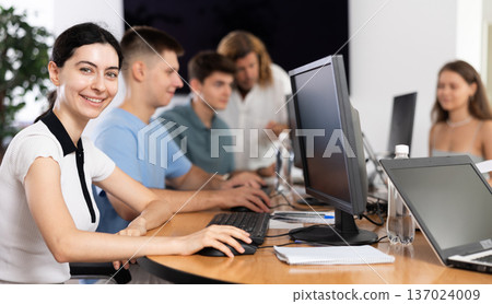 Female student is engrossed 137024009