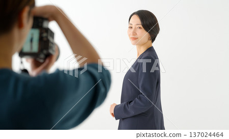 Businesswoman taking a profile photo Businesswoman taking a profile photo 137024464