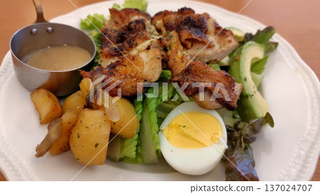 High-protein grilled chicken and boiled egg salad plate High-protein grilled chicken and boiled egg salad plate 137024707