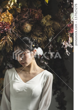 Bride wearing a wedding dress Bride wearing a wedding dress 137025276