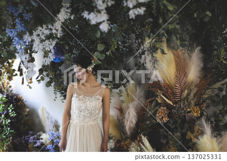 Bride wearing a wedding dress Bride wearing a wedding dress 137025331