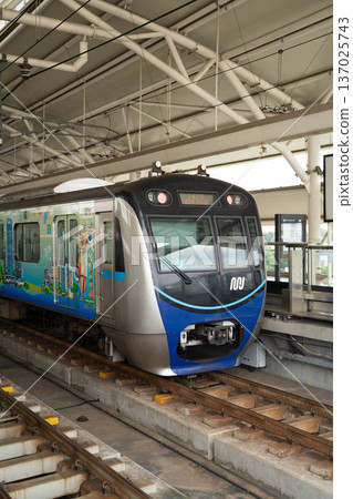 A train stopping at a Jakarta MRT station A train stopping at a Jakarta MRT station 137025743