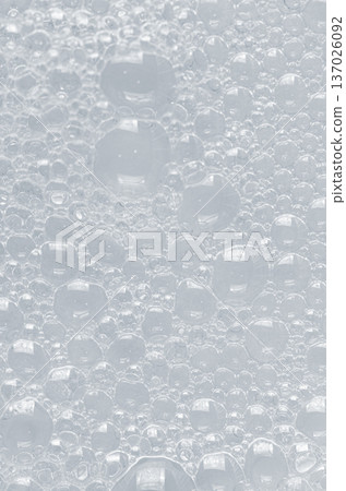 Bubbles of body gel or shampoo or shaving gel. Closeup. Bubbles of body gel or shampoo or shaving gel. Closeup. 137026092