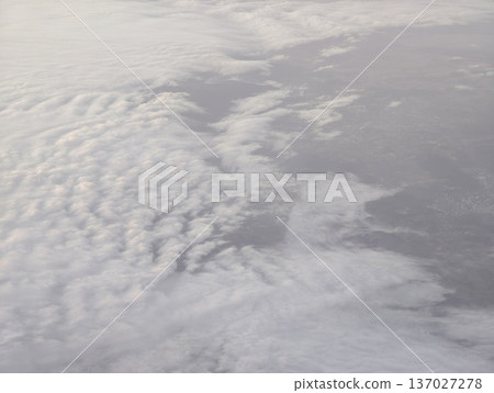 Gentle cloud cover with luminous aura, Vast white cloud canopy casting peaceful and luminous atmosphere Gentle cloud cover with luminous aura, Vast white cloud canopy casting peaceful and luminous atmosphere 137027278