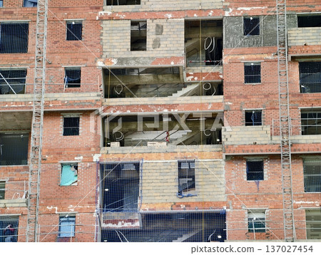 Apartment facade with construction components, Construction elements of city apartment facade shown 137027454