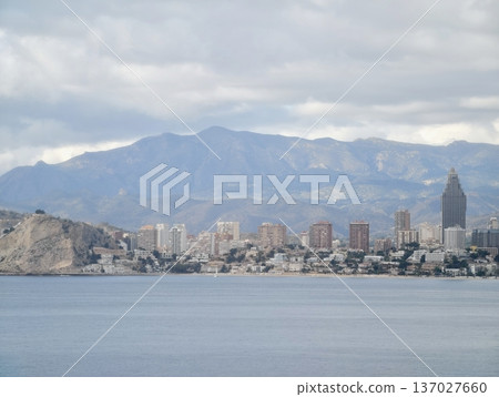 Coastal tower with peaceful bay, Distinctive tower rising over tranquil water and adjoined neighborhoods Coastal tower with peaceful bay, Distinctive tower rising over tranquil water and adjoined neighborhoods 137027660