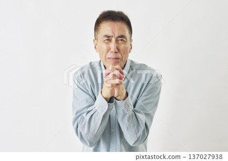 Man praying on white background Man praying on white background 137027938