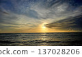 Golden Sunset over the Ocean Horizon 137028206
