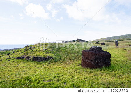 Pukao at Ahu Vinapu, with a female Moai in the background, Site No. 2, Easter Island Pukao at Ahu Vinapu, with a female Moai in the background, Site No. 2, Easter Island 137028210
