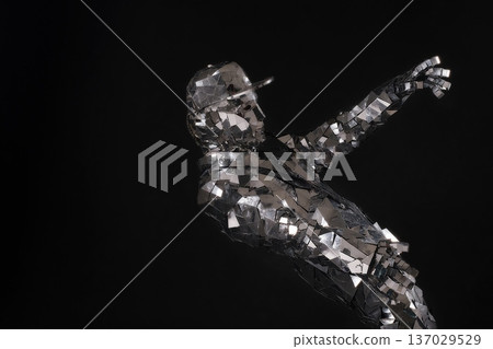 Reflective dance figure captured in a creative artistic installation Reflective dance figure captured in a creative artistic installation 137029529