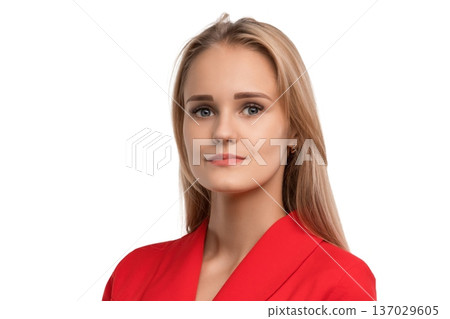 Confident woman in red blazer poses against plain background Confident woman in red blazer poses against plain background 137029605