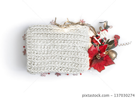 Christmas composition with knitted element in the center on copy space. Christmas composition with knitted element in the center on copy space. 137030274