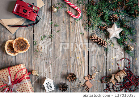 Christmas flat lay background on wooden surface, copy space. Christmas flat lay background on wooden surface, copy space. 137030353