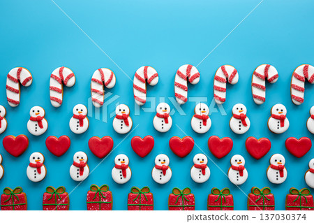 Christmas gingerbread on a blue background, flat lay. Christmas gingerbread on a blue background, flat lay. 137030374