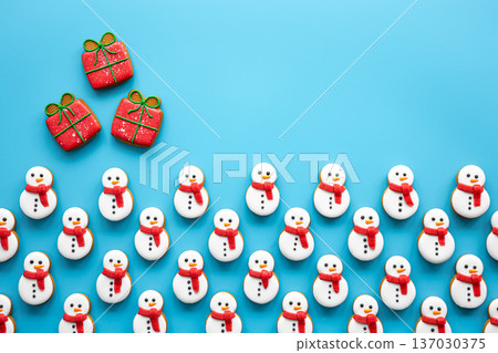 Christmas gingerbread on a blue background, flat lay. Christmas gingerbread on a blue background, flat lay. 137030375