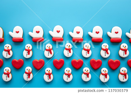 Christmas gingerbread on a blue background, flat lay. Christmas gingerbread on a blue background, flat lay. 137030379