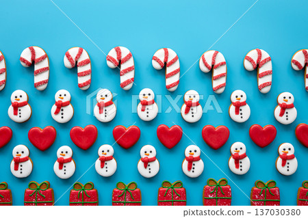 Christmas gingerbread on a blue background, flat lay. Christmas gingerbread on a blue background, flat lay. 137030380