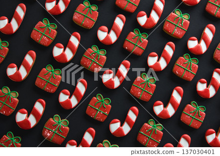 Christmas handmade gingerbread cookies covered with multi-colored icing. 137030401