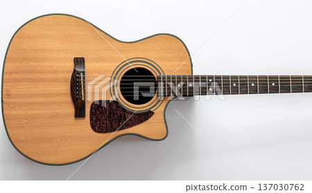 Acoustic guitar on a white background, top view, copy space. 137030762