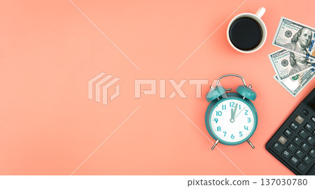 Alarm clock, dollar bills and a cup of coffee, flat lay. Alarm clock, dollar bills and a cup of coffee, flat lay. 137030780