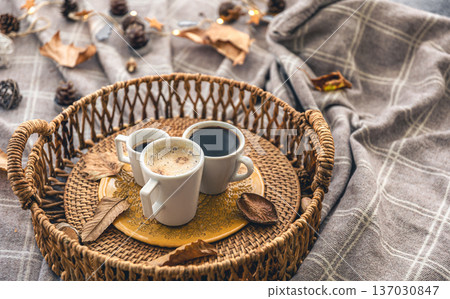 Autumn composition with cups of coffee and leaves. Autumn composition with cups of coffee and leaves. 137030847