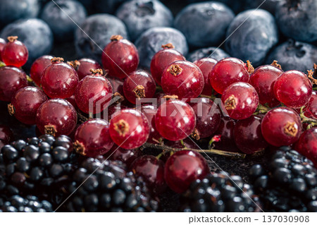 Background from a mix of different berries, macro photography. Background from a mix of different berries, macro photography. 137030908