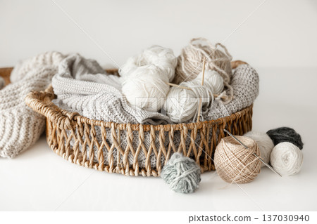 Basket with yarn close-up, threads for knitting. Basket with yarn close-up, threads for knitting. 137030940