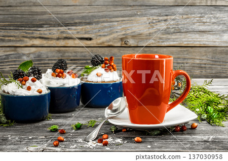 beautiful Christmas cupcake with cream and berry beautiful Christmas cupcake with cream and berry 137030958
