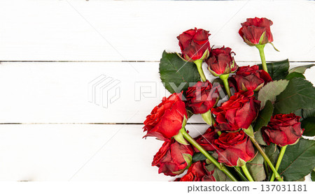 Bouquet of red roses on a white background, flat lay, copy space. Bouquet of red roses on a white background, flat lay, copy space. 137031181