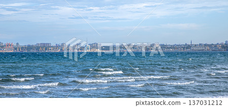 Beautiful sea in windy weather with waves in the city. 137031212