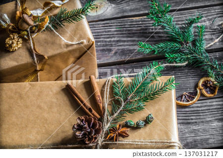 beautifully Packed with gift on wooden background 137031217