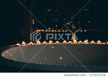 Burning candles in the bathroom in the dark. Burning candles in the bathroom in the dark. 137031258